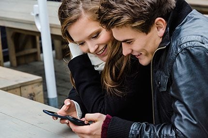 Guy and Girl Exchanging Numbers