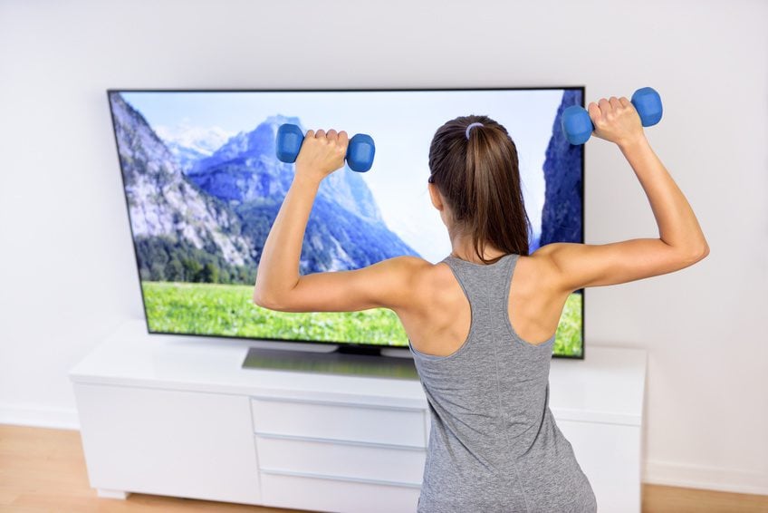 Guess she likes watching landscapes while working out