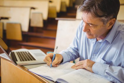 Professor writing
