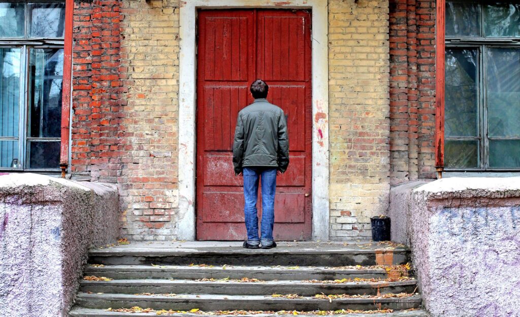 Man outside of house