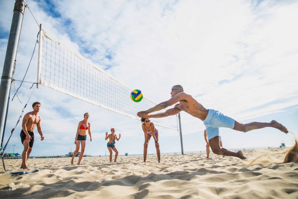 Playing volleyball