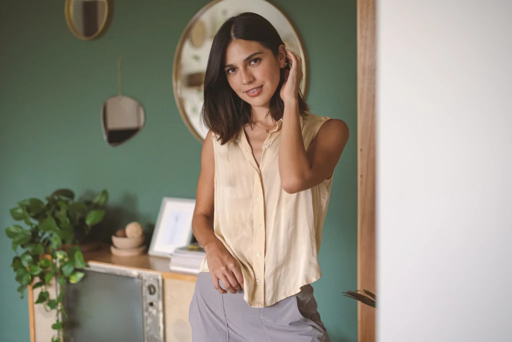 woman touching her hair